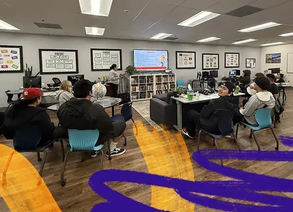 high school students in classroom during group lecture