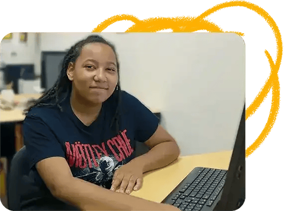 Student working at a computer in the classroom