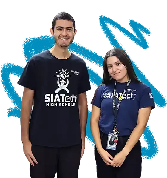 Two students from SIATech High School standing side by side, wearing branded t-shirts