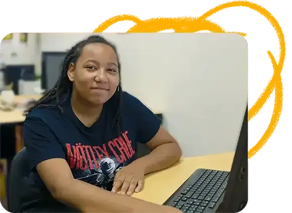 Student working at a computer in the classroom